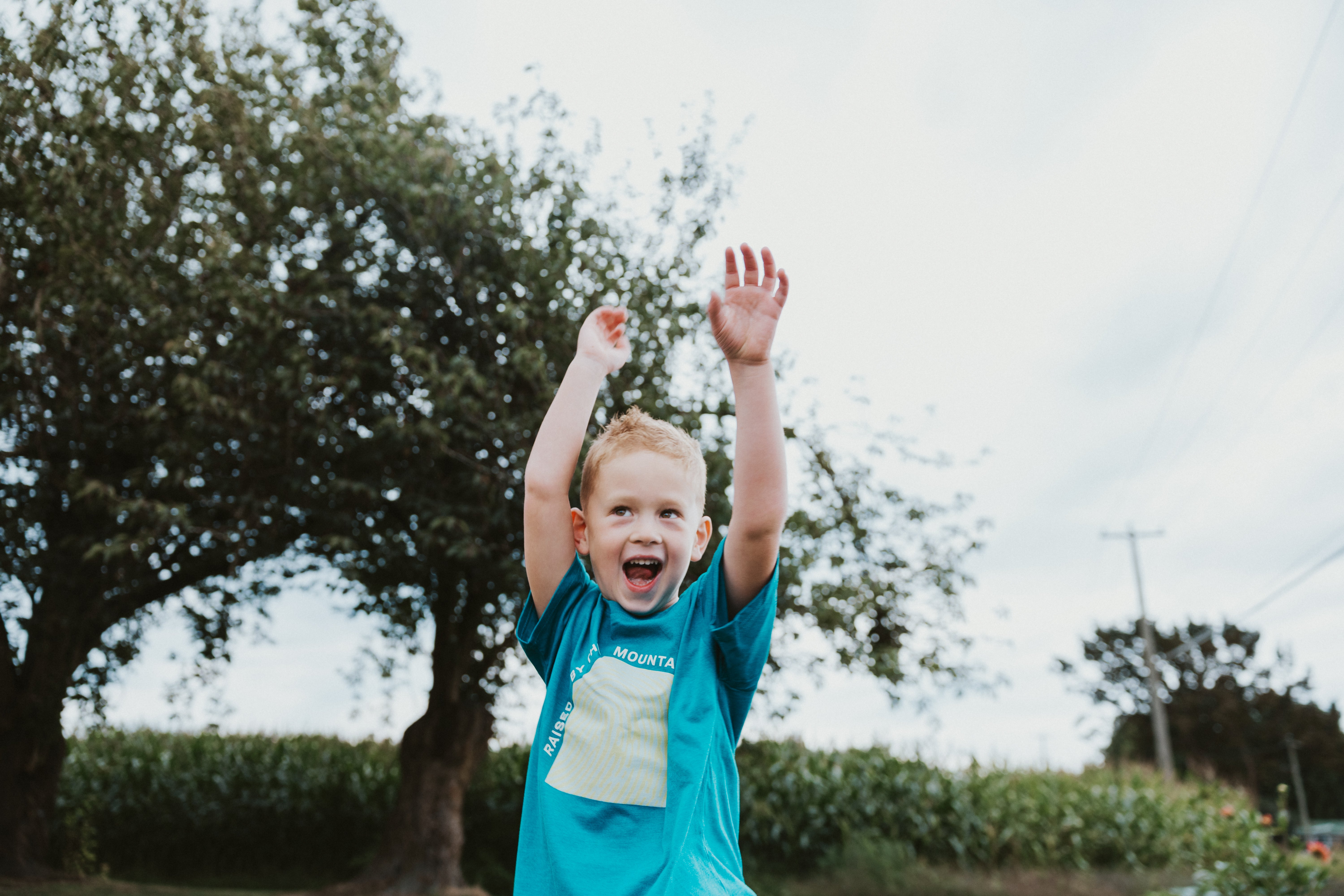 Raised by the Mountains Kids Tee